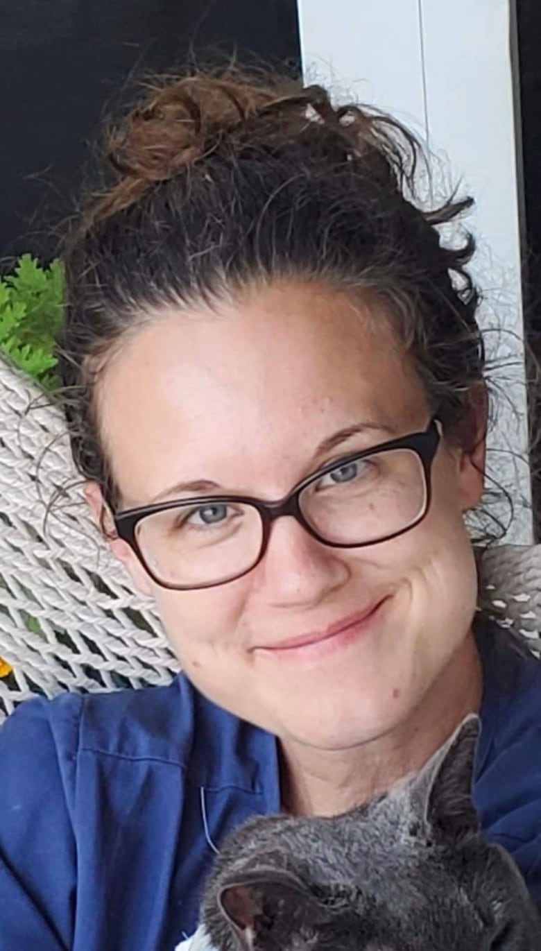 Headshot of a smiling young woman.