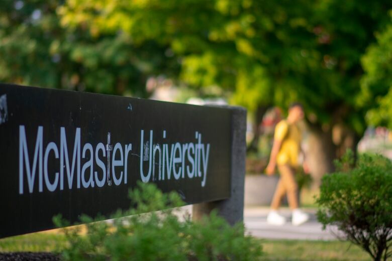 A sign with the words McMaster University on it