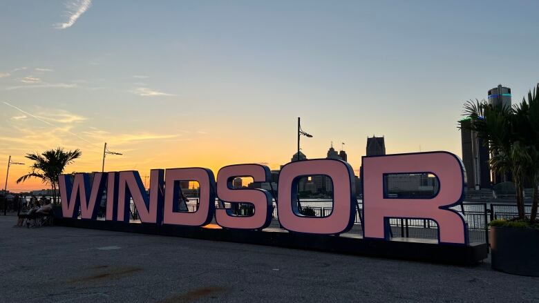 Windsor sign sits on the city's riverfront.  