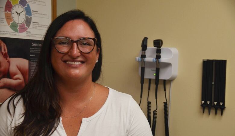 Nurse practitioner Trivia Provost stands in an exam room in the Wawa hospital. 