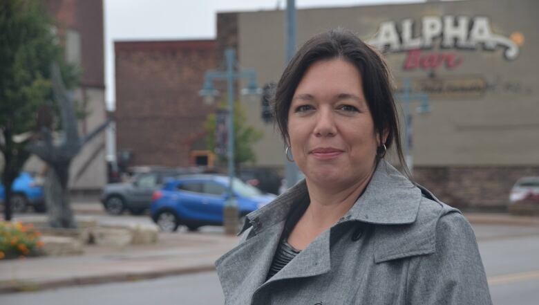 Nichole Causley stands in downtown Sault Ste. Marie, Michigan. 