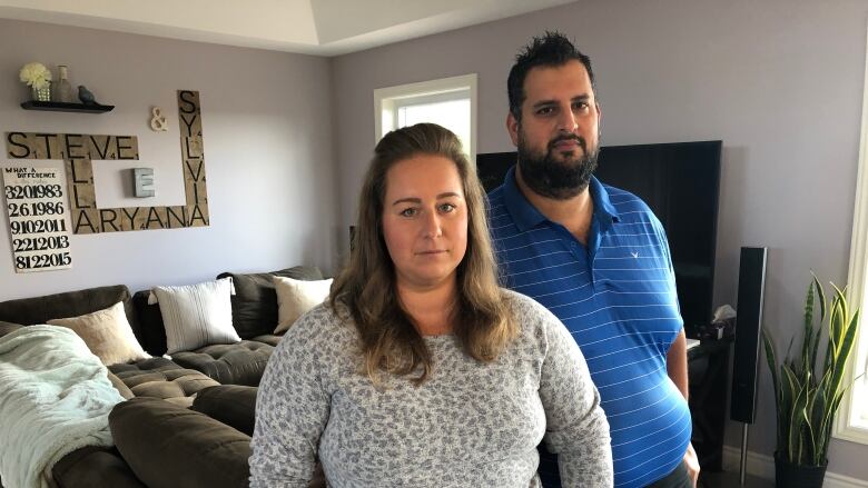 Sylvia and Steve El-Helou stand in their Stoney Point home they are hoping to sell.