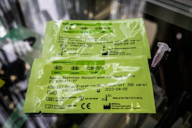 Two testing kits marked 'rapid response benzodiazepine test strip'.