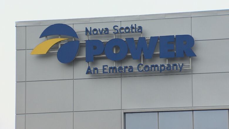 The side of a building with a sign that says Nova Scotia Power.