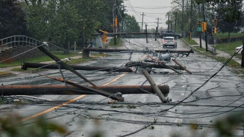 Joshawa Tyler LaVoie captured this striking image of downed power lines and poles on Woodlawn Road in Dartmouth.