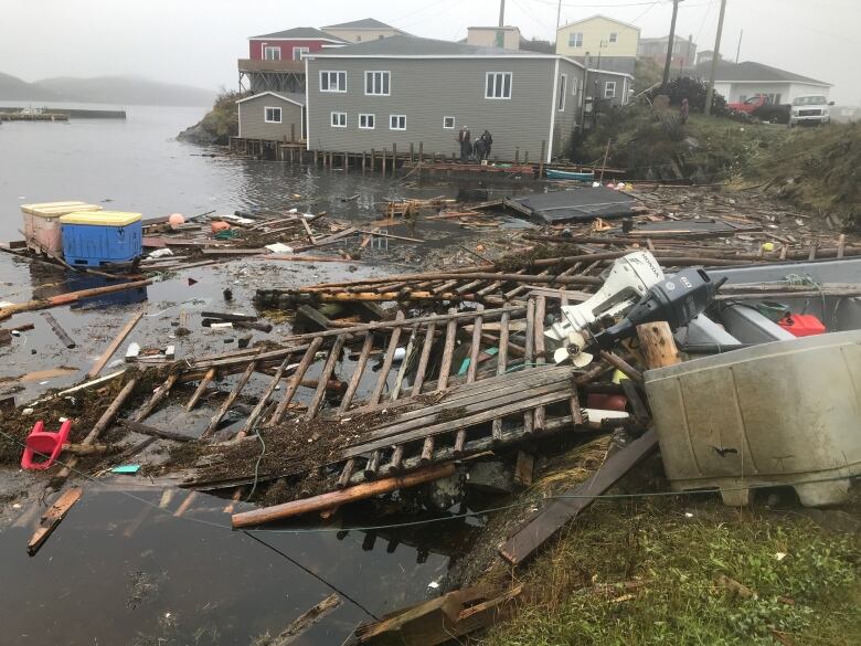 A demolished fishing wharf sits in the water following post-tropical storm Fiona.