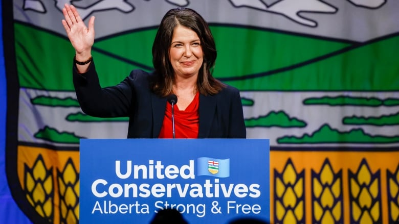 Danielle Smith waves to the crowd.