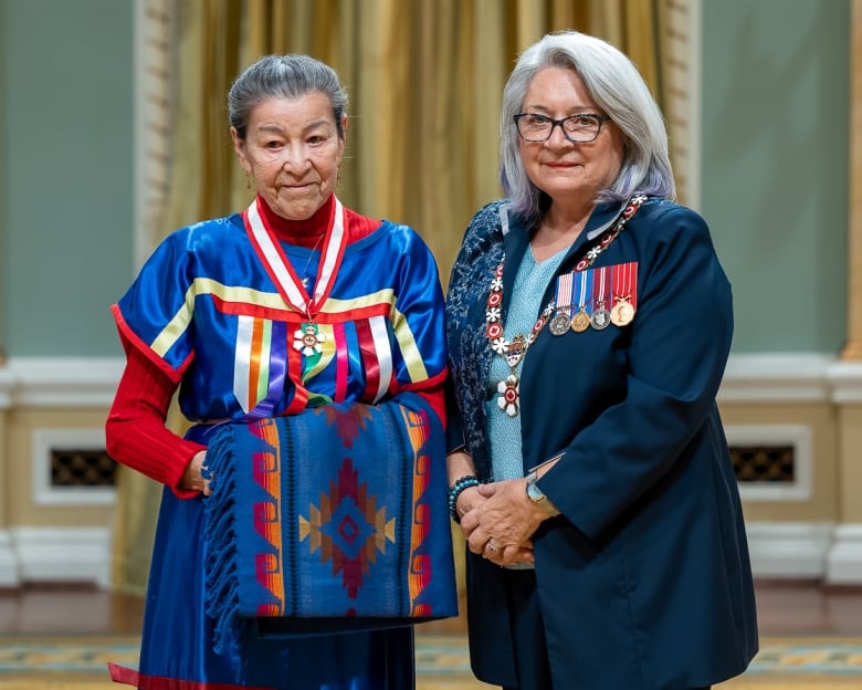 Member of the Order of Canada Doreen Spence and Governor General Mary Simon pose for a photo at Rideau Hall Thursday after Spence was given one of Canada's highest honours.