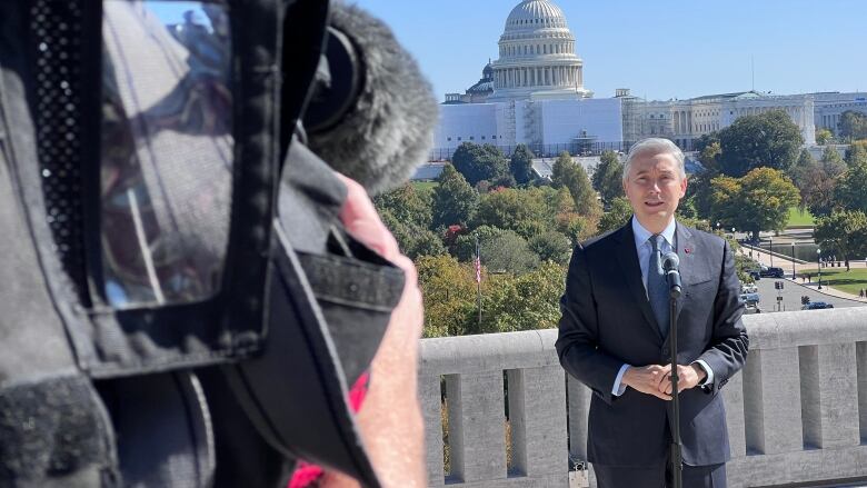 Federal minister Franois-Philippe Champagne holds a news conference on the rooftop of the Canadian embassy in Washington on Friday.  