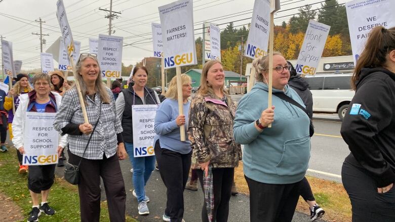 Education workers picketting in Nova Scotia last year. Economists say new rounds of wage negotiations in 2023 and 2024 to catch up with inflation could themselves contribute to inflation.