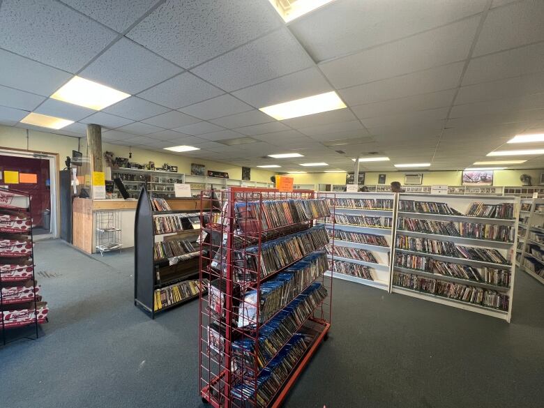 Inside a DVD rental store.