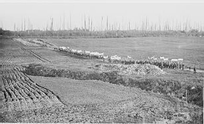 UBC students march to Point Grey on Oct. 28, 1922 to protest a delay to finishing the school's campus there.