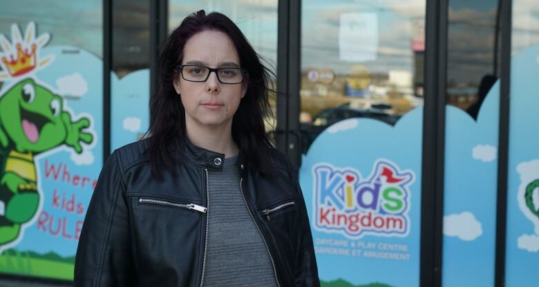 Amanda Hart stands in front of Kids Kingdom in Orlans.