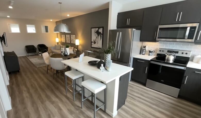 A brand-new modern looking kitchen in side a home that was purpose-built to accommodate multiple generations.