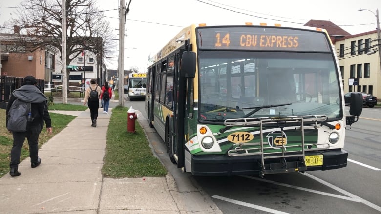 Cape Breton Transit buses line up on George Street in Sydney.