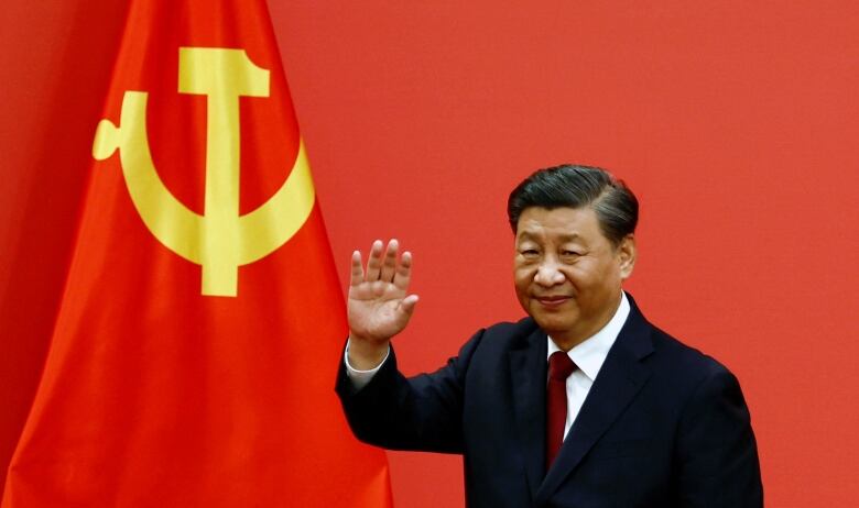 Chinese President Xi Jinping waves