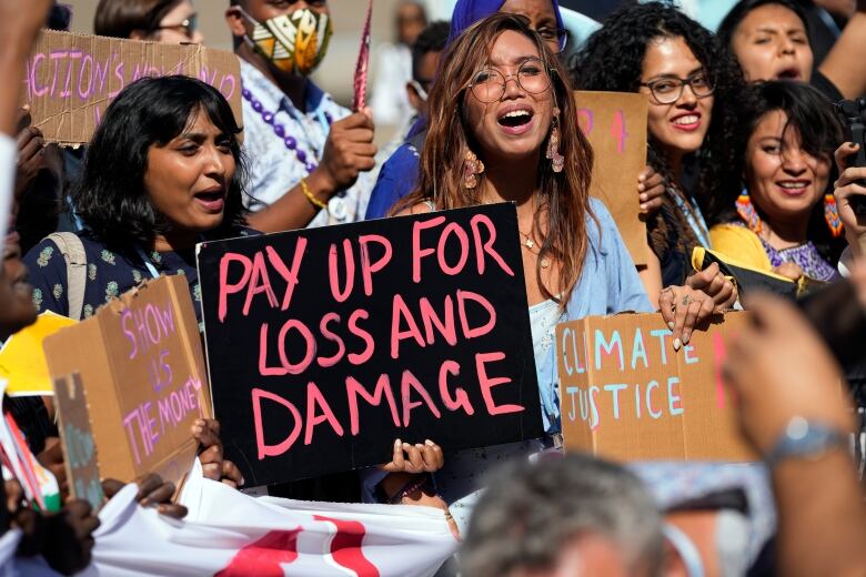 A protest calling for money for climate action at COP27 on Nov. 11 in Sharm el-Sheikh, Egypt. Calls for loss and damage funding have featured prominently at this conference. Peter Dejong/The Associated Press