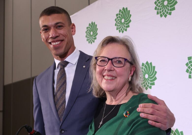 Co-leadership candidates Jonathan Pedneault and Elizabeth May pose for a photo before the new leader of the Green Party is chosen in Ottawa on Saturday, November 19, 2022.