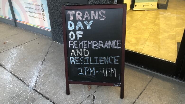 A chalkboard saying Trans Day of Remembrance and Resilience from 2p-m to 4p-m