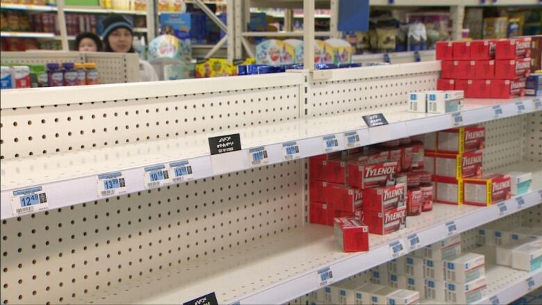 Bare shelves at a store.