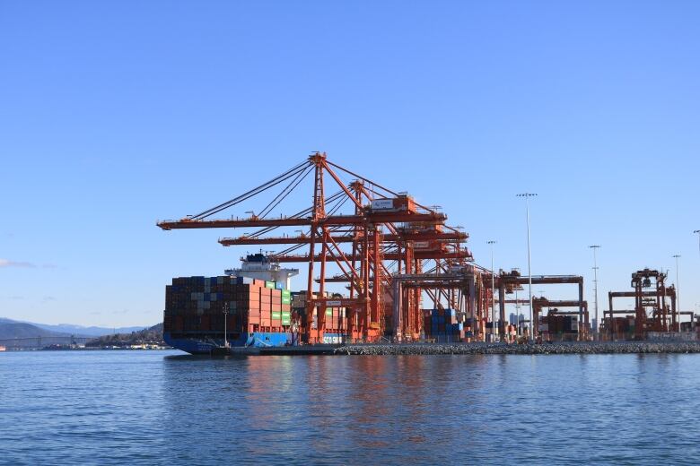 A container ship unloads at the Port of Vancouver.