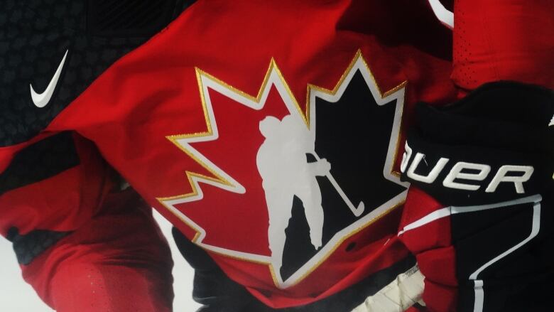 A Hockey Canada logo is shown on a jersey.