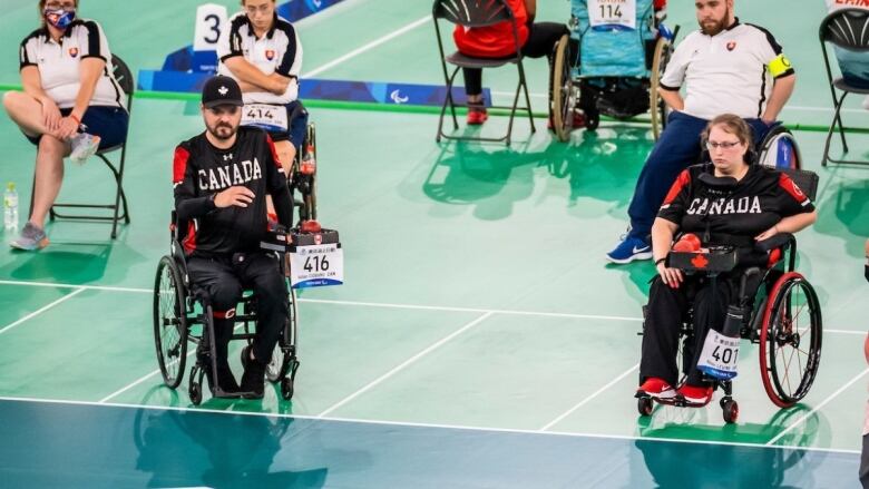 Alison Levine, right, and Iulian Ciobanu representing Canada.