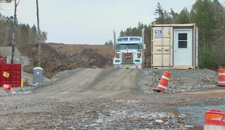 A truck pulls out of the entrance to the Aerotech Park Connector site in Wellington, N.S.