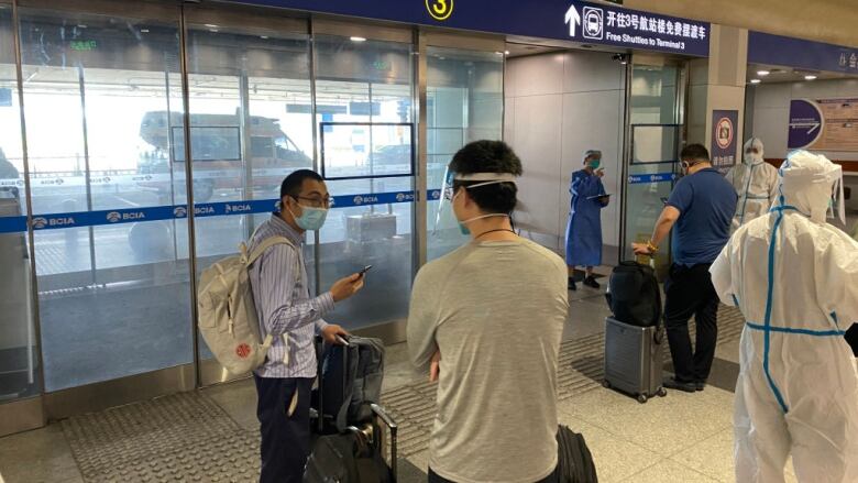 Passengers at Beijing International Airport.