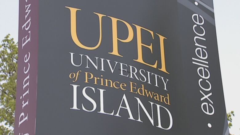 The University of Prince Edward Island sign is pictured in closeup. 