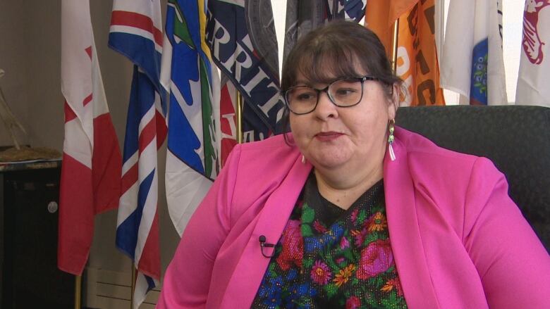 Treaty Commissioner Mary Culbertson sitting in her office