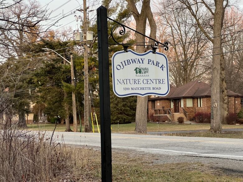 A hanging sign reads 'Ojibway Park.'