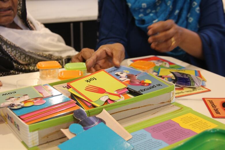 Flash cards sit on a table.