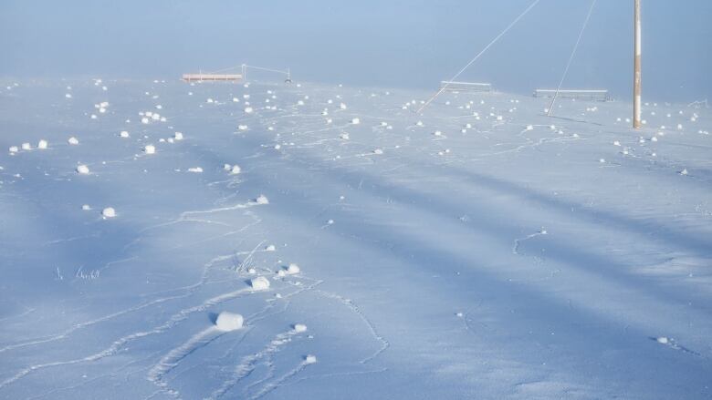 Snow rollers appear in a field near Macrorie, Sask. earlier this month.