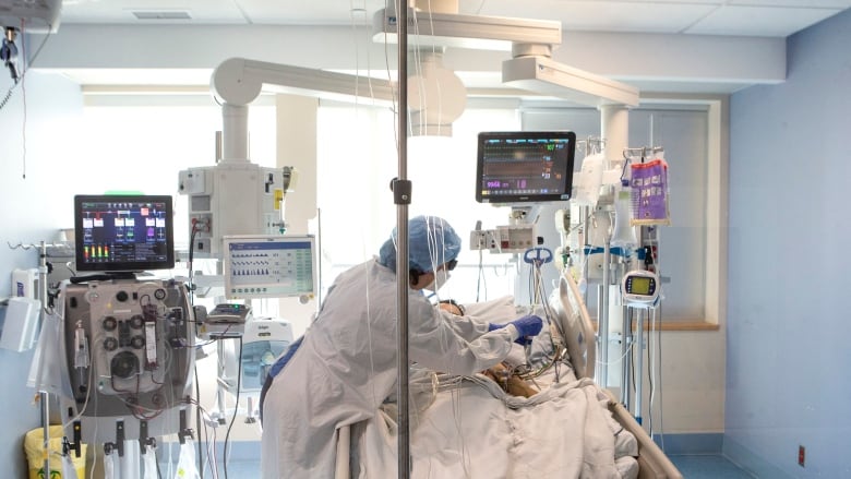 A nurse tends to a patient in Sarnia, Ontario. 