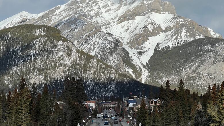 See Banff Ave, surrounding mountains.