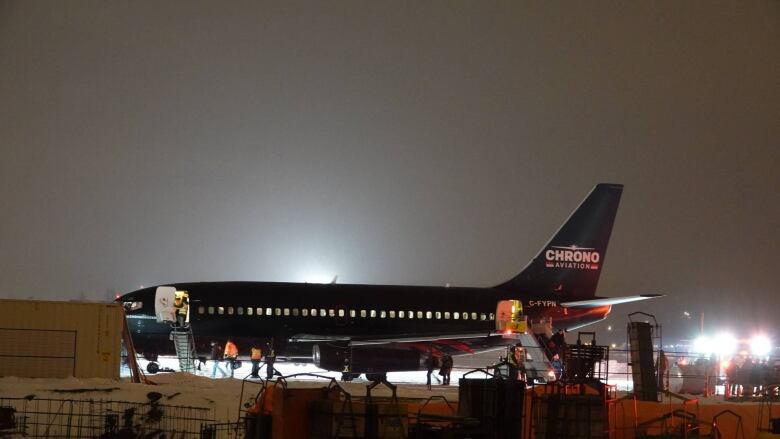 An airplane at night. 