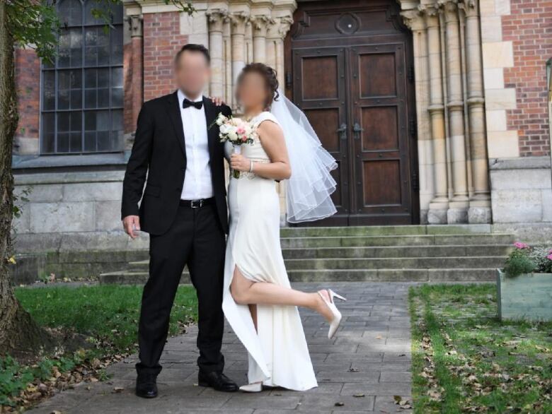 A man and a woman on their wedding day.