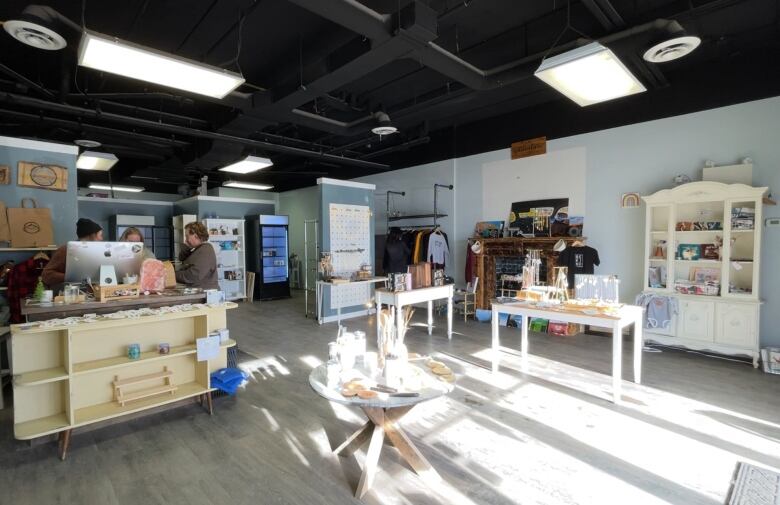 The interior of the store, which will soon close. Many of the shelves are empty as owners sell the remaining stock.