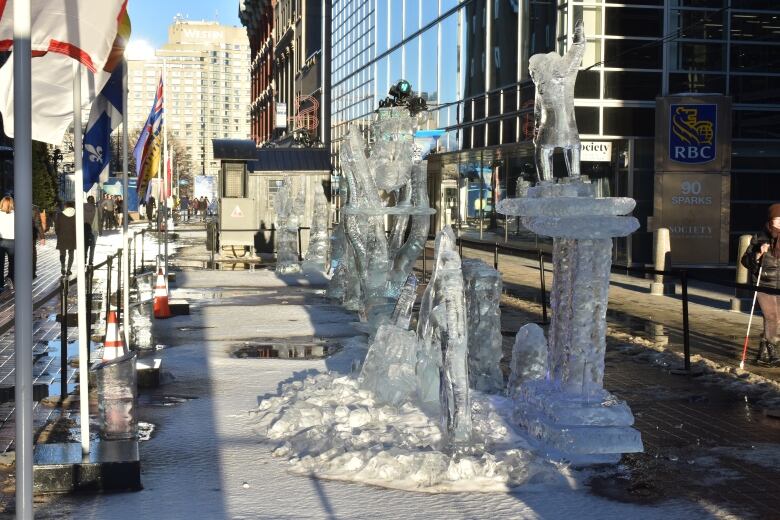 Ice sculptures melt in the setting sun during Winterlude in Ottawa.