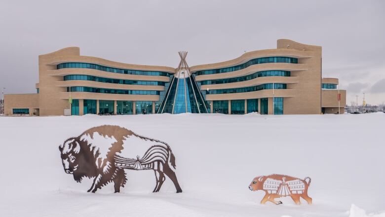 Buffalo sculptures are show in front of First Nations University on Jan. 25, 2023.