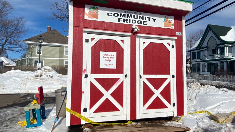 The Summerside community fridge is surrounded by police tape after a fire Saturday night.