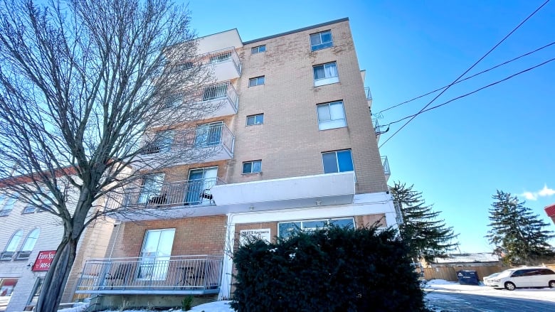 The front of a five-storey apartment building.