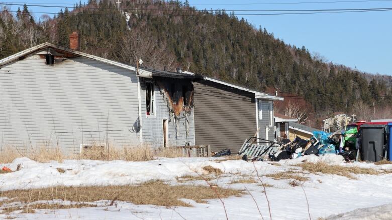 A burned house in relation to the homicide arrest in Eskasoni.