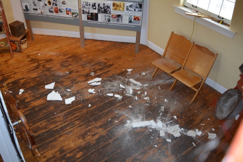 Pieces of plaster on a floor.