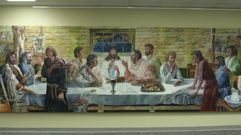 A large painting that depicts the scene from The Last Supper.