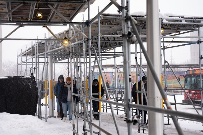 OC Transpo wants to remove the scaffolding that provides weather protection at Tunney's Pasture station this year, even though the entire bus platform will be revamped in 2026. 