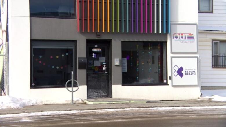 Exteriors of a building with rainbow wall.