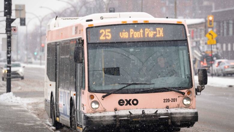 An Exo bus driving on a snowy day. 