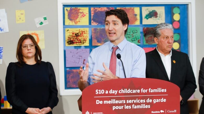 Manitoba Premier Heather Stefanson and Federal Minister of Northern Affairs, Dan Vandal, listen in as Prime Minister Justin Trudeau speaks at the YMWCA daycare in Winnipeg, Friday, March  3, 2023. Trudeau said Manitoba will achieve an average of $10-a-day child care by April 2, three years ahead of schedule for the Liberal government's target for its national plan.